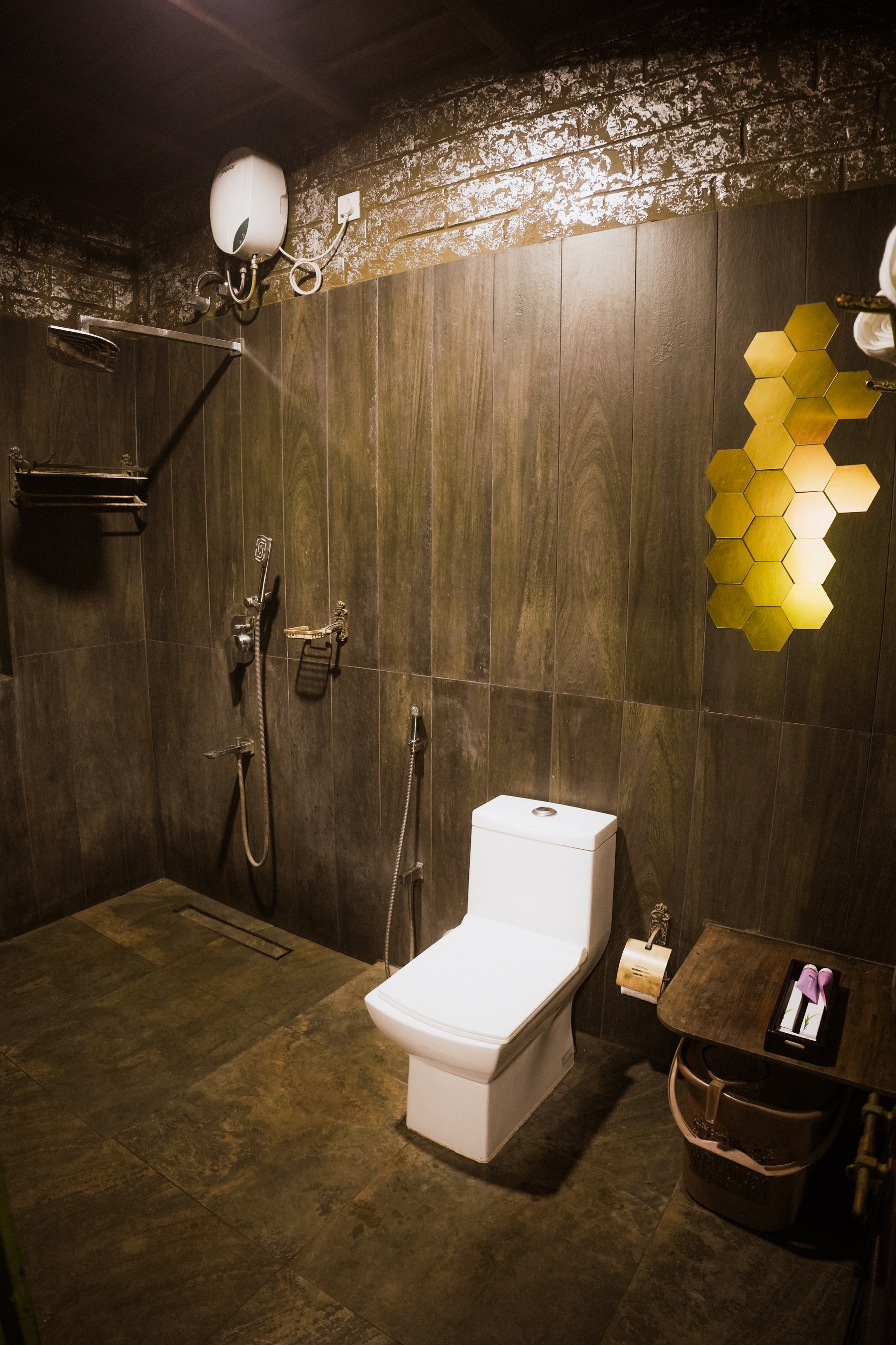 Dark tiled modern bathroom